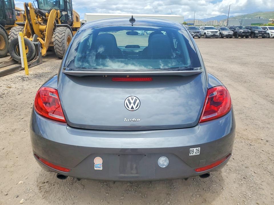 Photo 6 from auction – 2014 VOLKSWAGEN BEETLE with VIN 3VWVT7AT6EM662472