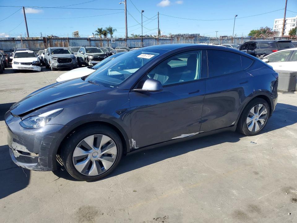 TESLA MODEL Y 2023 with VIN 7SAYGDED3PF941314 - Photo from auction