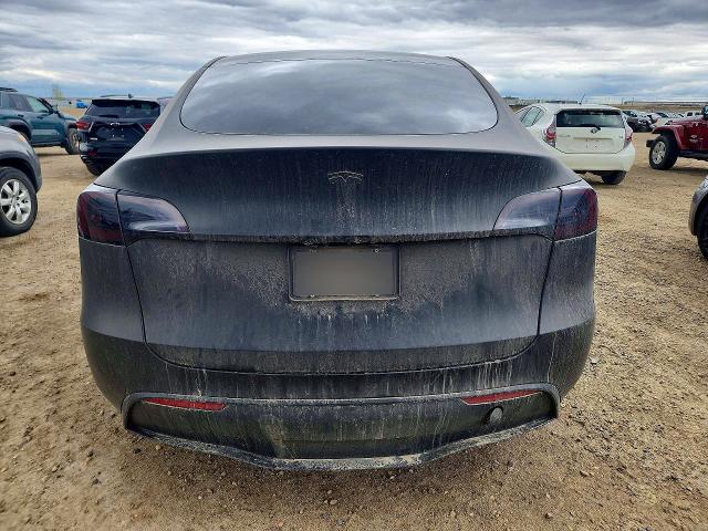 Photo 6 from auction – 2023 TESLA MODEL Y with VIN LRWYGDFD3PC057864