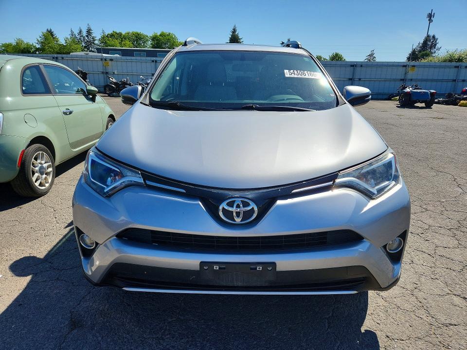 Photo 5 from auction – 2016 TOYOTA RAV4 with VIN 2T3RFREV9GW476588