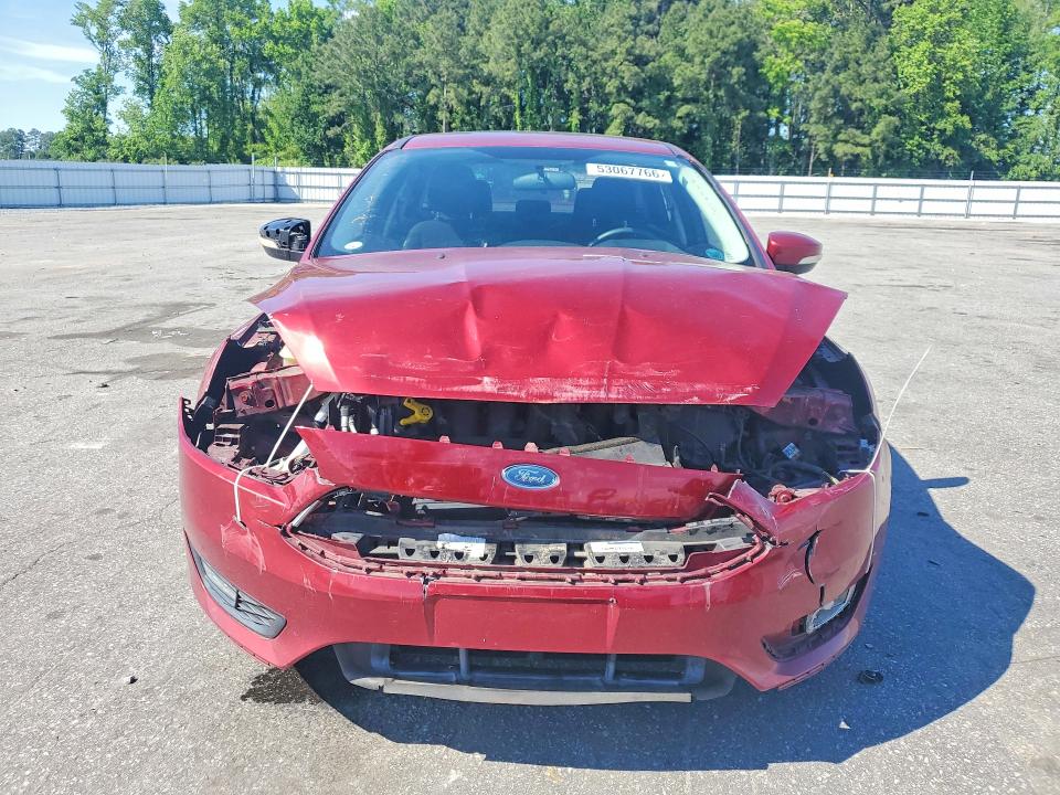 Photo 5 from auction – 2015 FORD FOCUS with VIN 1FADP3F29FL338727
