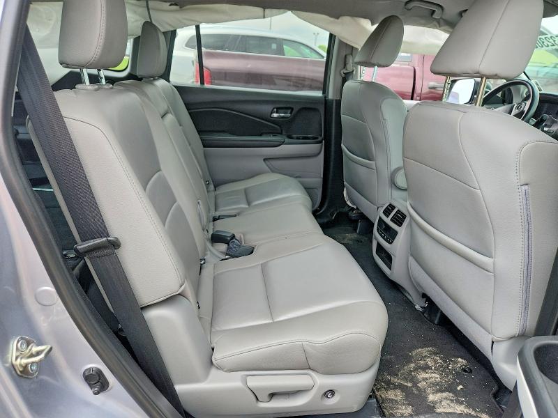 Photo 11 from auction – 2018 HONDA PILOT with VIN 5FNYF6H59JB052041