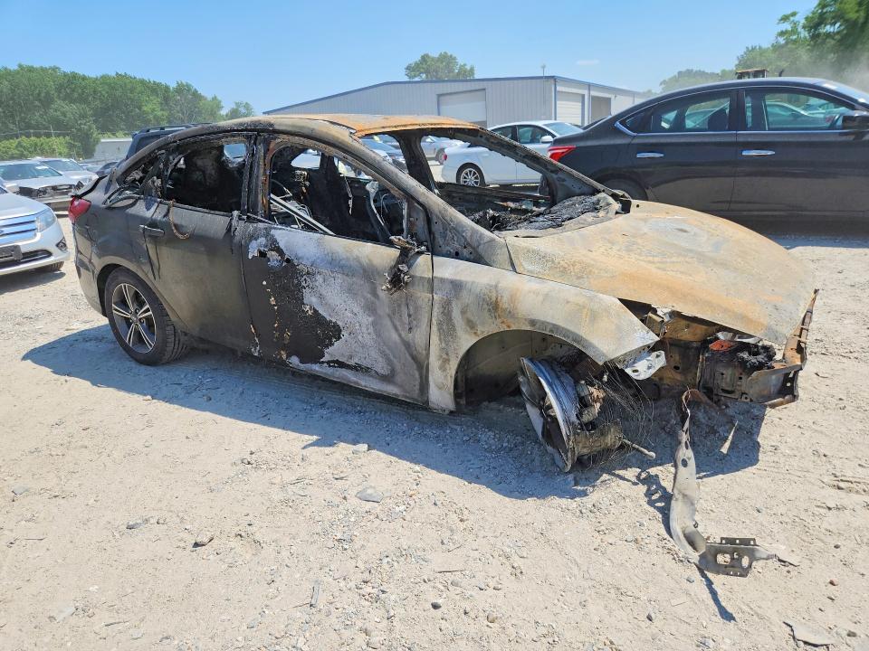 Photo 4 from auction – 2016 FORD FOCUS with VIN 1FADP3FE3GL266564