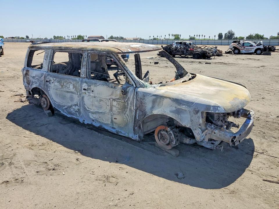 Photo 4 from auction – 2016 FORD FLEX with VIN 2FMGK5C88GBA00548