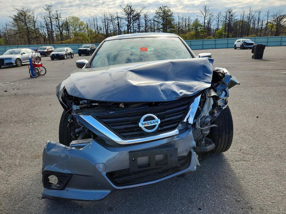 Photo 5 from auction – 2017 NISSAN ALTIMA with VIN 1N4AL3AP7HC495791