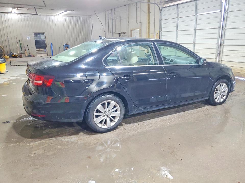 Снимка 3 от търг – 2016 VOLKSWAGEN JETTA с VIN 3VWD67AJ3GM240759