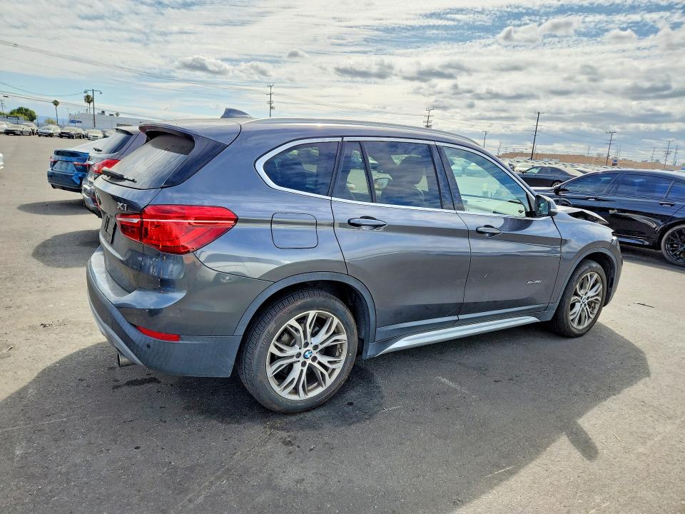 Фото 3 с аукциона – 2016 BMW X1 с VIN WBXHT3Z32G4A47743