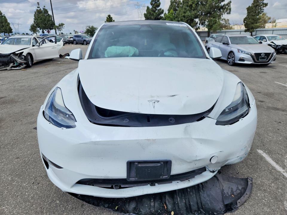 Photo 5 from auction – 2023 TESLA MODEL Y with VIN 7SAYGAEE9PF659881