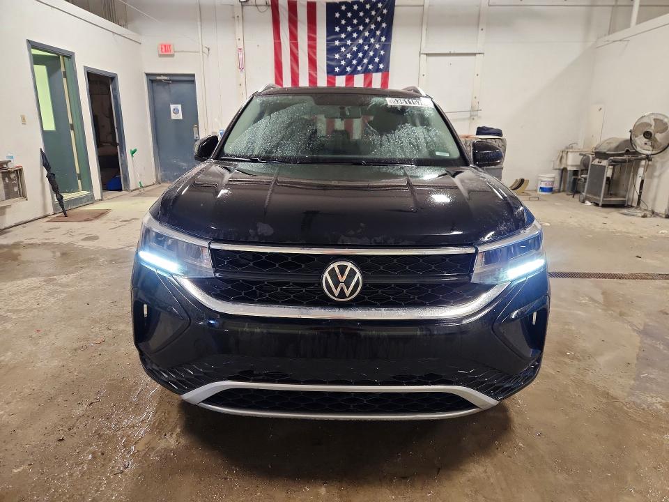 Photo 5 from auction – 2022 VOLKSWAGEN TAOS with VIN 3VVLX7B2XNM056811