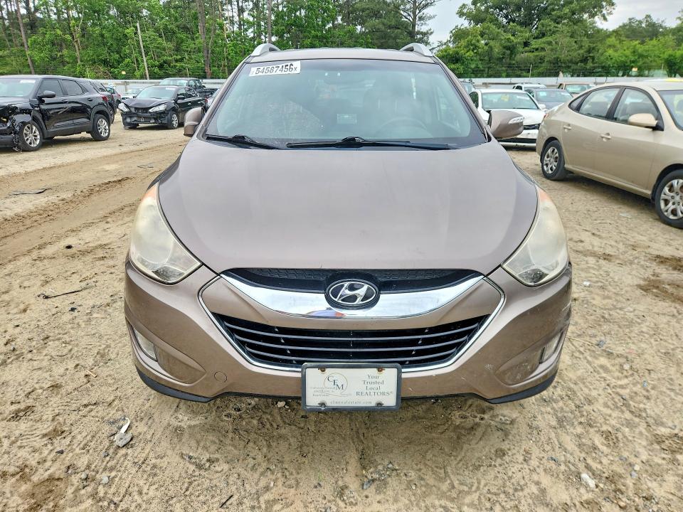 Photo 5 from auction – 2011 HYUNDAI TUCSON with VIN KM8JUCAC5BU194776