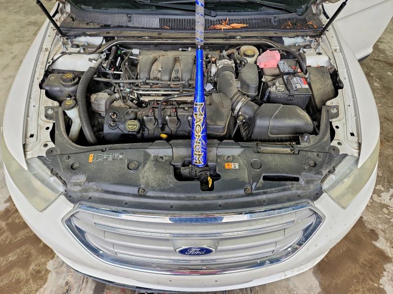 Photo 11 from auction – 2014 FORD TAURUS with VIN 1FAHP2E84EG136189