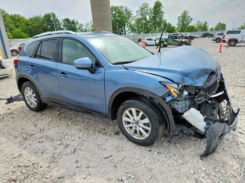 Photo 4 from auction – 2014 MAZDA CX-5 with VIN JM3KE4CY1E0403678