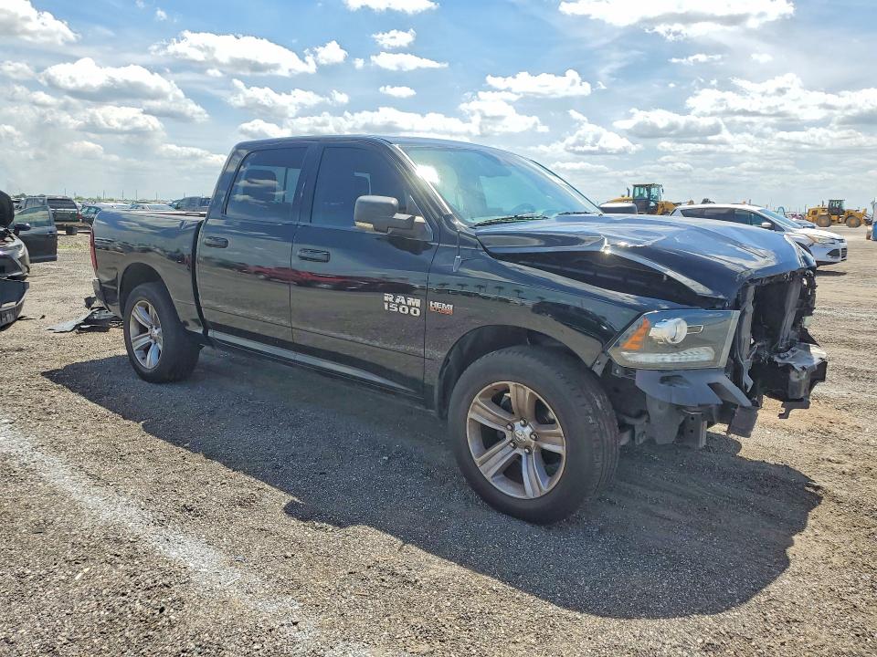 Photo 4 from auction – 2014 RAM 1500 with VIN 1C6RR6MTXES177064