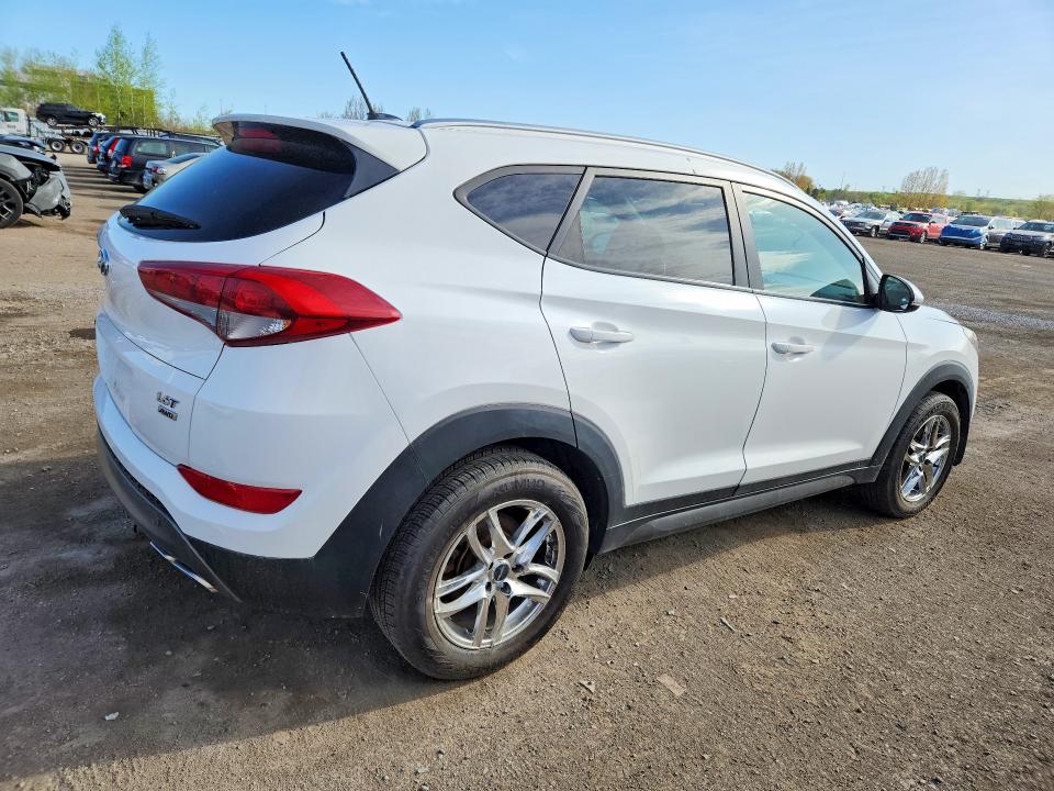 Photo 3 from auction – 2016 HYUNDAI TUCSON with VIN KM8J3CA28GU058272
