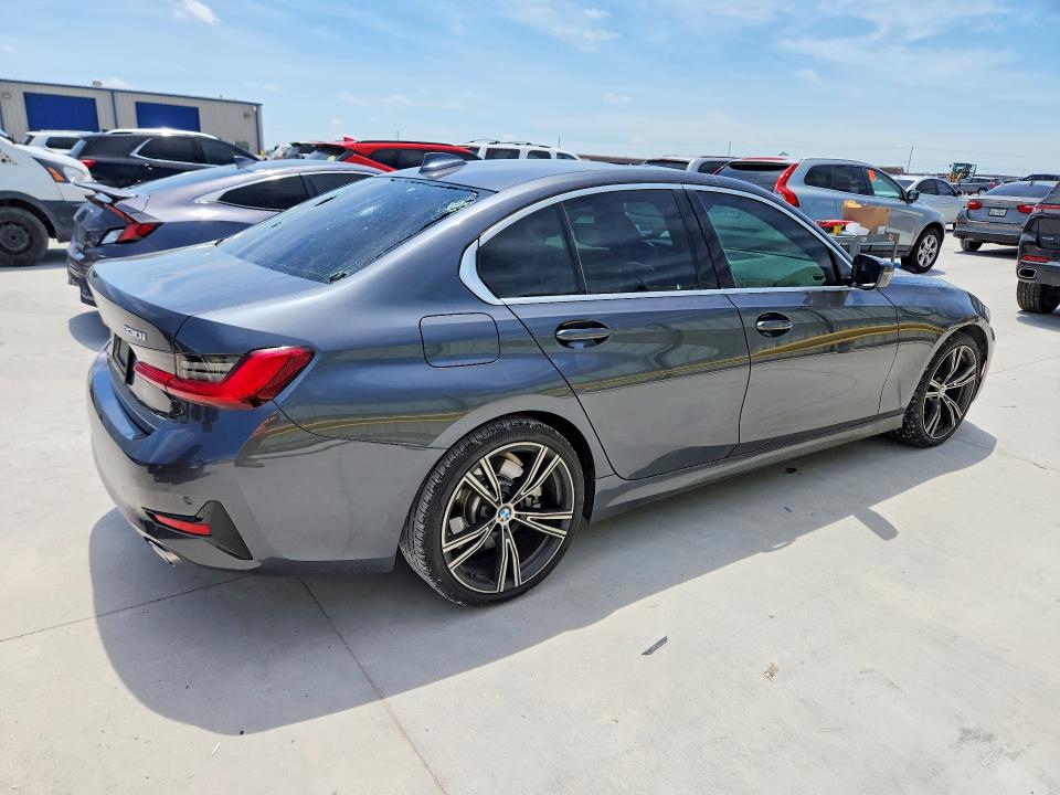 Photo 3 from auction – 2021 BMW 330I with VIN 3MW5R1J08M8B53203