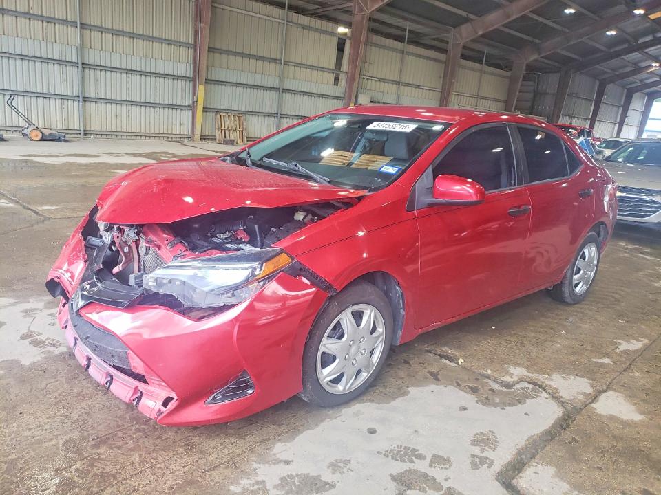 TOYOTA COROLLA 2018 with VIN 5YFBURHE3JP759511 - Photo from auction