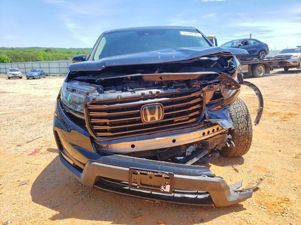 Photo 5 from auction – 2021 HONDA RIDGELINE with VIN 5FPYK3F11MB027351