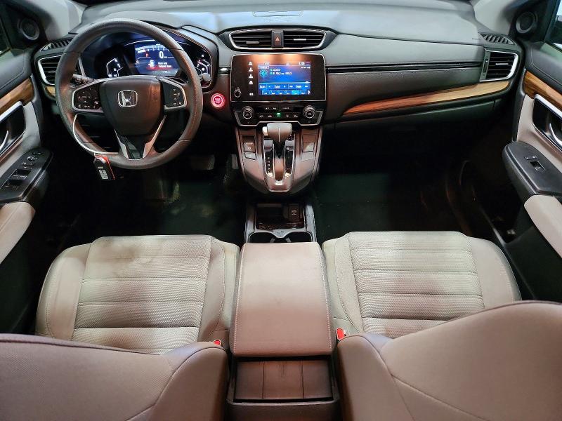 Photo 8 from auction – 2018 HONDA CR-V with VIN 7FARW1H54JE037815