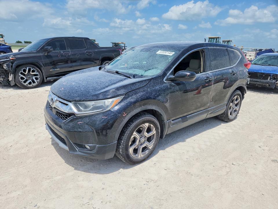 Photo 1 from auction – 2018 HONDA CR -V with VIN 7FARW2H58JE048578