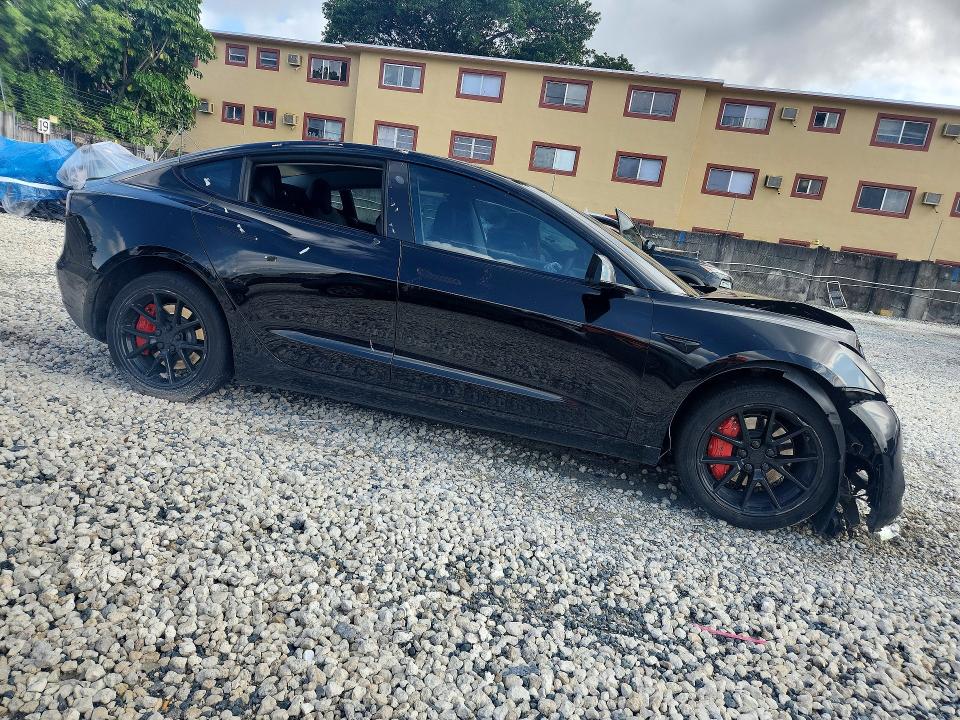 Photo 4 from auction – 2022 TESLA MODEL 3 with VIN 5YJ3E1EA2NF187675