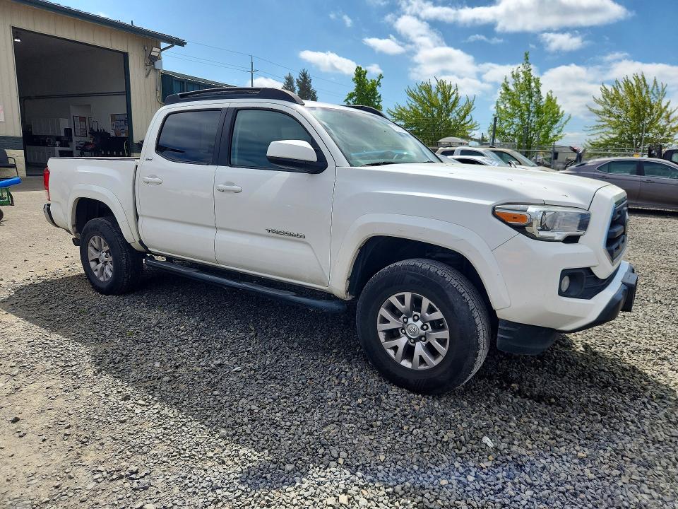 Photo 4 from auction – 2016 TOYOTA TACOMA with VIN 3TMAZ5CN8GM013360