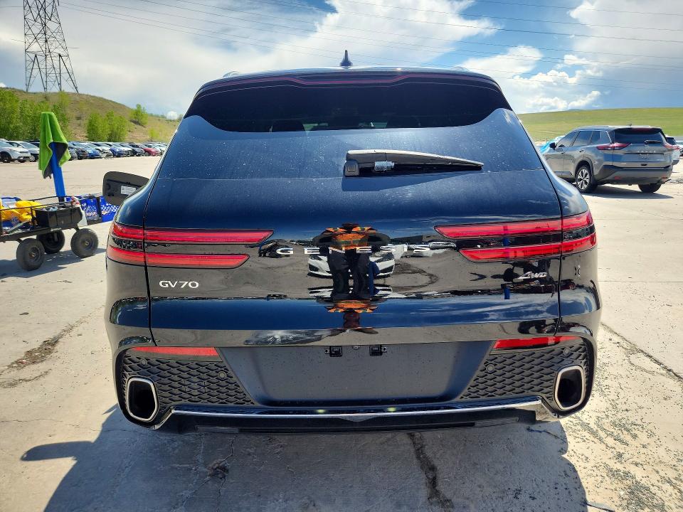 Photo 6 from auction – 2022 GENESIS GV70 with VIN KMUMADTB9NU071066