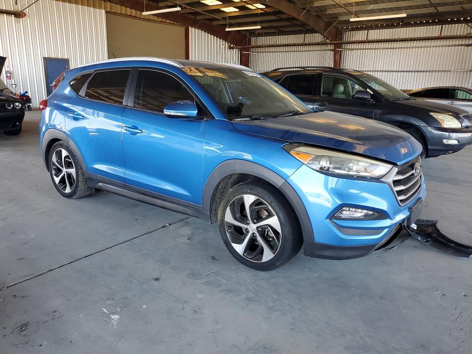 Photo 4 from auction – 2016 HYUNDAI TUCSON with VIN KM8J33A24GU049097