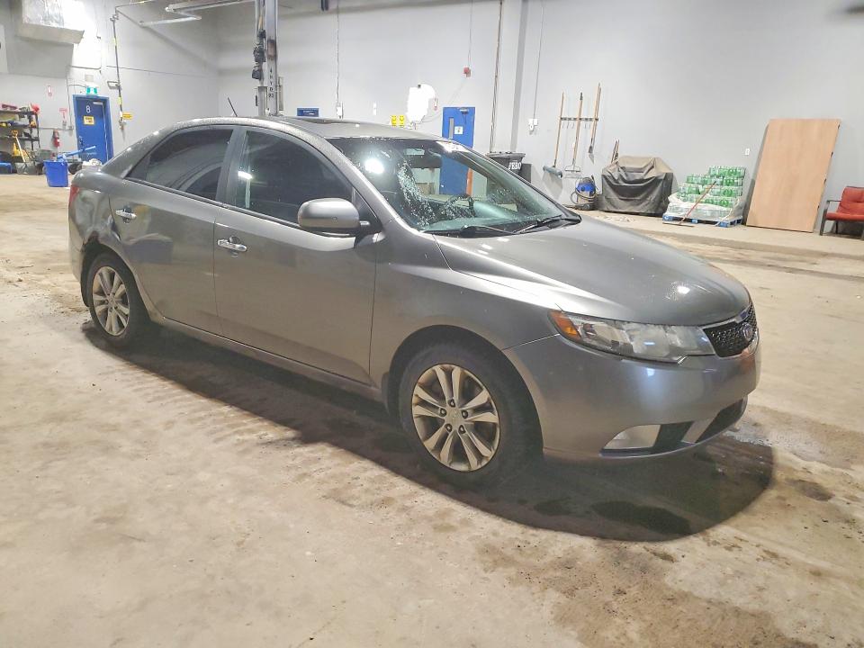Photo 4 from auction – 2011 KIA FORTE with VIN KNAFW4A36B5384524