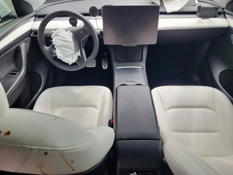 Photo 8 from auction – 2023 TESLA MODEL Y with VIN 7SAYGAEE9PF659881