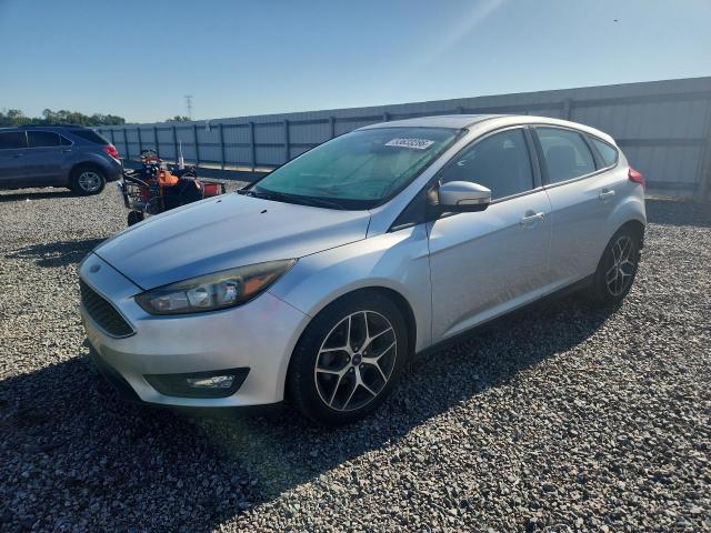 FORD FOCUS 2017 with VIN 1FADP3M2XHL210552 - Photo from auction