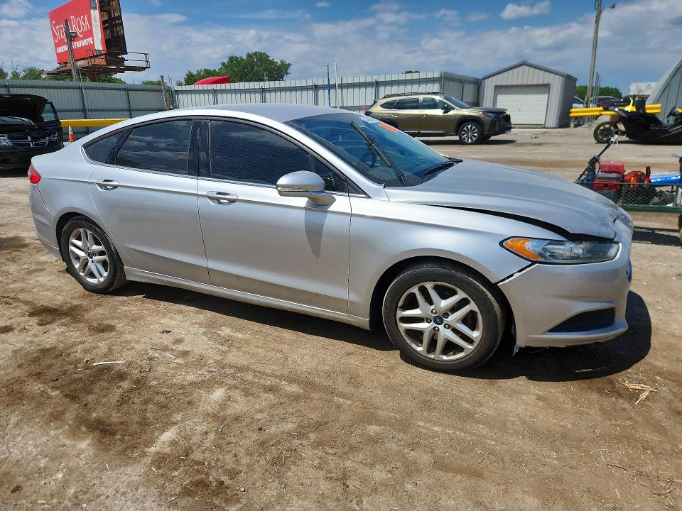 Photo 4 from auction – 2015 FORD FUSION with VIN 3FA6P0H70FR194230