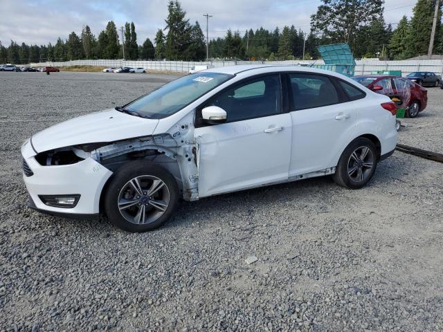 FORD FOCUS SE 2018 with VIN 1FADP3F25JL271598 - Photo from auction