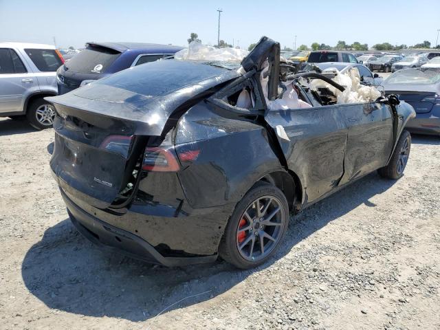 Photo 3 from auction – 2023 TESLA MODEL Y with VIN 7SAYGDEF0PF601992