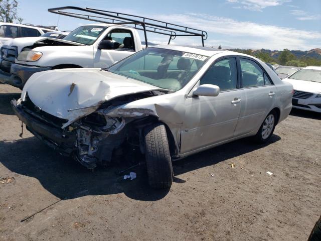 TOYOTA CAMRY LE 2003 with VIN 4T1BE30K03U243023 - Photo from auction