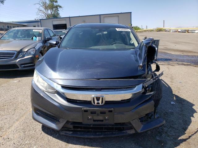 Photo 5 from auction – 2018 HONDA CIVIC EX with VIN 19XFC2F77JE004766