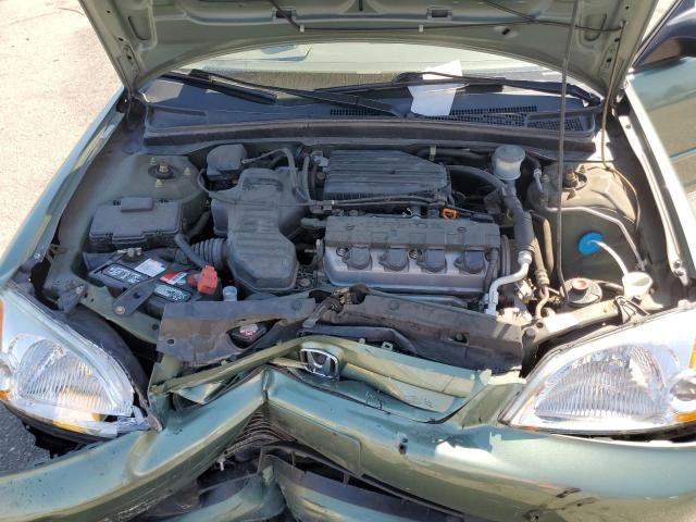 Photo 11 from auction – 2003 HONDA CIVIC LX with VIN 2HGES16563H543590