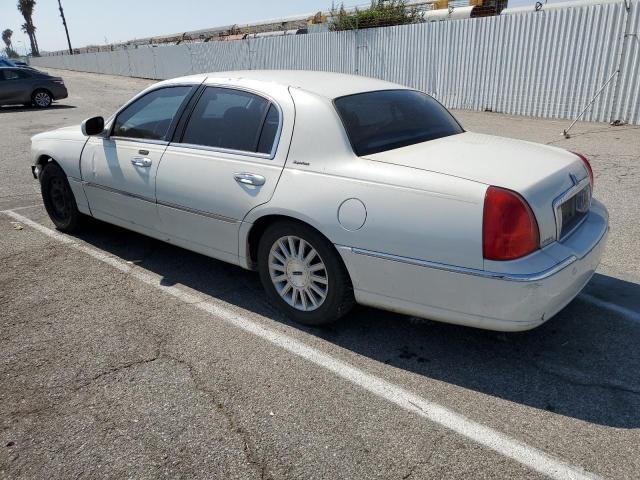 Photo 2 from auction – 2004 LINCOLN TOWN CAR E with VIN 1LNHM81WX4Y644097
