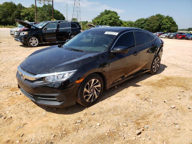 HONDA CIVIC EX 2018 with VIN 2HGFC2F71JH526542 - Photo from auction