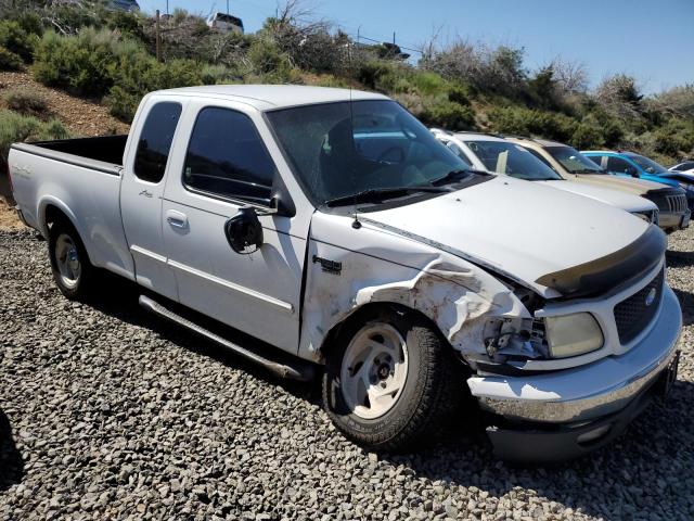 Photo 4 from auction – 2000 FORD F150 with VIN 1FTRX18L9YKA52038