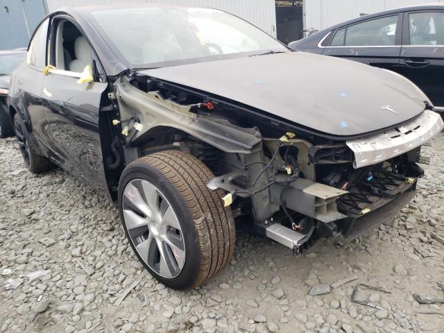 Photo 4 from auction – 2022 TESLA MODEL Y with VIN 7SAYGDEE6NF315214