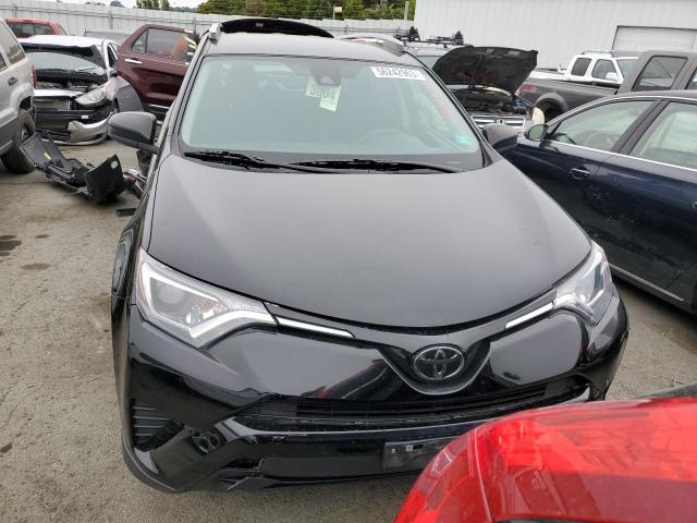 Photo 5 from auction – 2018 TOYOTA RAV4 LE with VIN 2T3ZFREV3JW490705