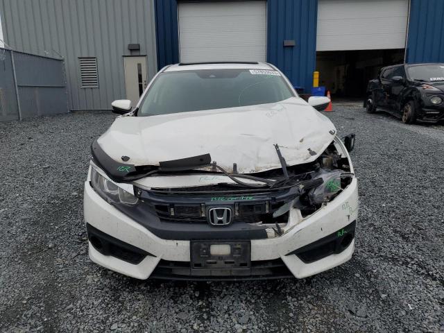 Photo 5 from auction – 2017 HONDA CIVIC EX with VIN 2HGFC2F84HH003177