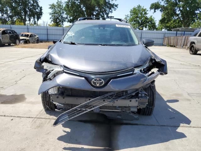 Photo 5 from auction – 2017 TOYOTA RAV4 LE with VIN JTMBFREV4HJ158489