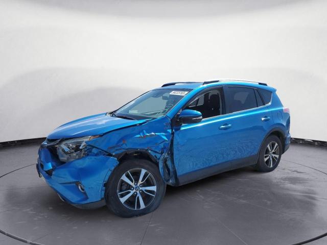 TOYOTA RAV4 XLE 2017 with VIN JTMRFREV1HJ165740 - Photo from auction