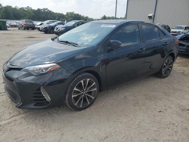 TOYOTA COROLLA L 2017 with VIN 2T1BURHE3HC829972 - Photo from auction