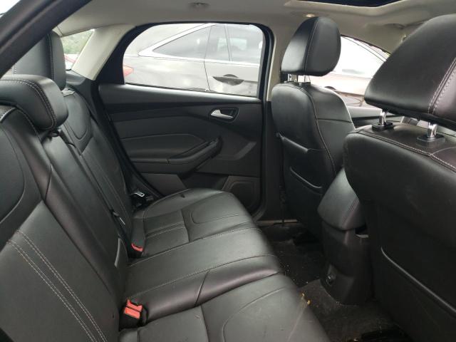 Photo 10 from auction – 2014 FORD FOCUS SE with VIN 1FADP3F29EL114212