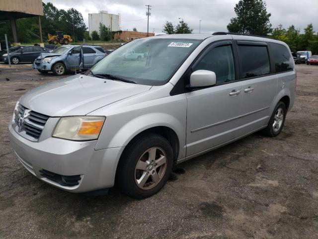 DODGE GRAND CARA 2010 with VIN 2D4RN5D12AR211767 - Photo from auction