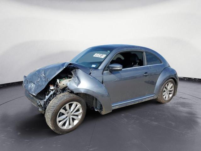 VOLKSWAGEN BEETLE 2014 with VIN 3VWJL7AT2EM608276 - Photo from auction
