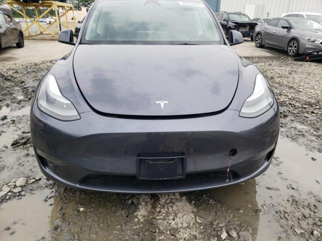 Photo 5 from auction – 2023 TESLA MODEL Y with VIN 7SAYGAEE5PF630233