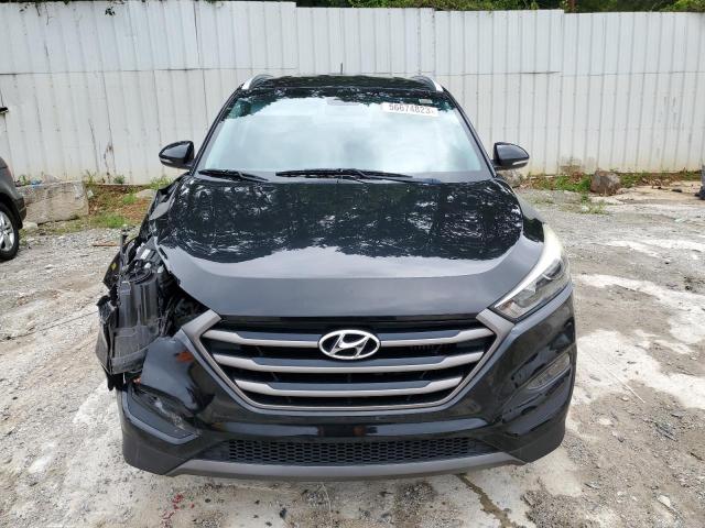 Photo 5 from auction – 2016 HYUNDAI TUCSON LIM with VIN KM8J33A20GU054457